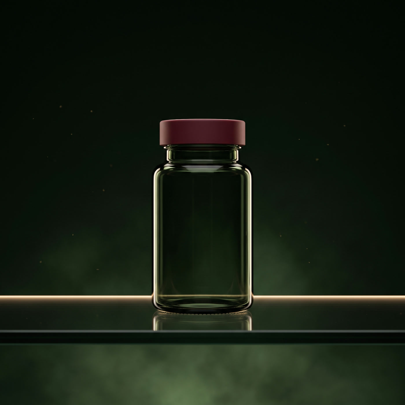 A small dark green glass bottle with a oxblood cap standing on the line of light.